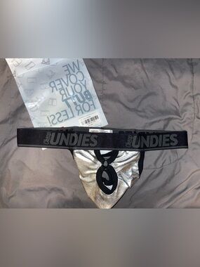 CheapUndies Silver Metallic Cutout Men's Thong with Black Waistband